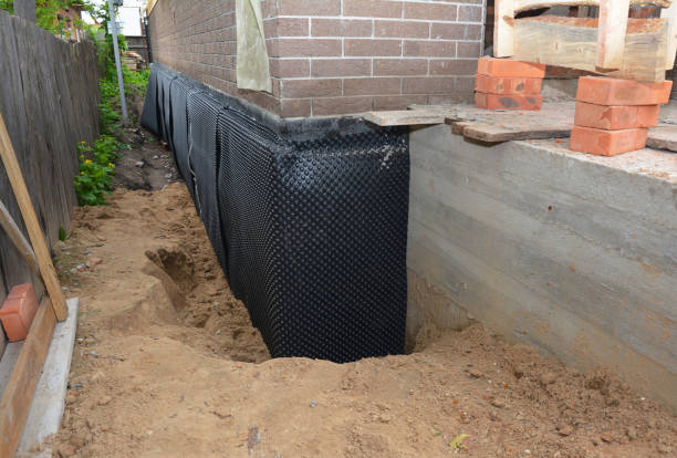 Happy homeowners after waterproofing job in Gardendale